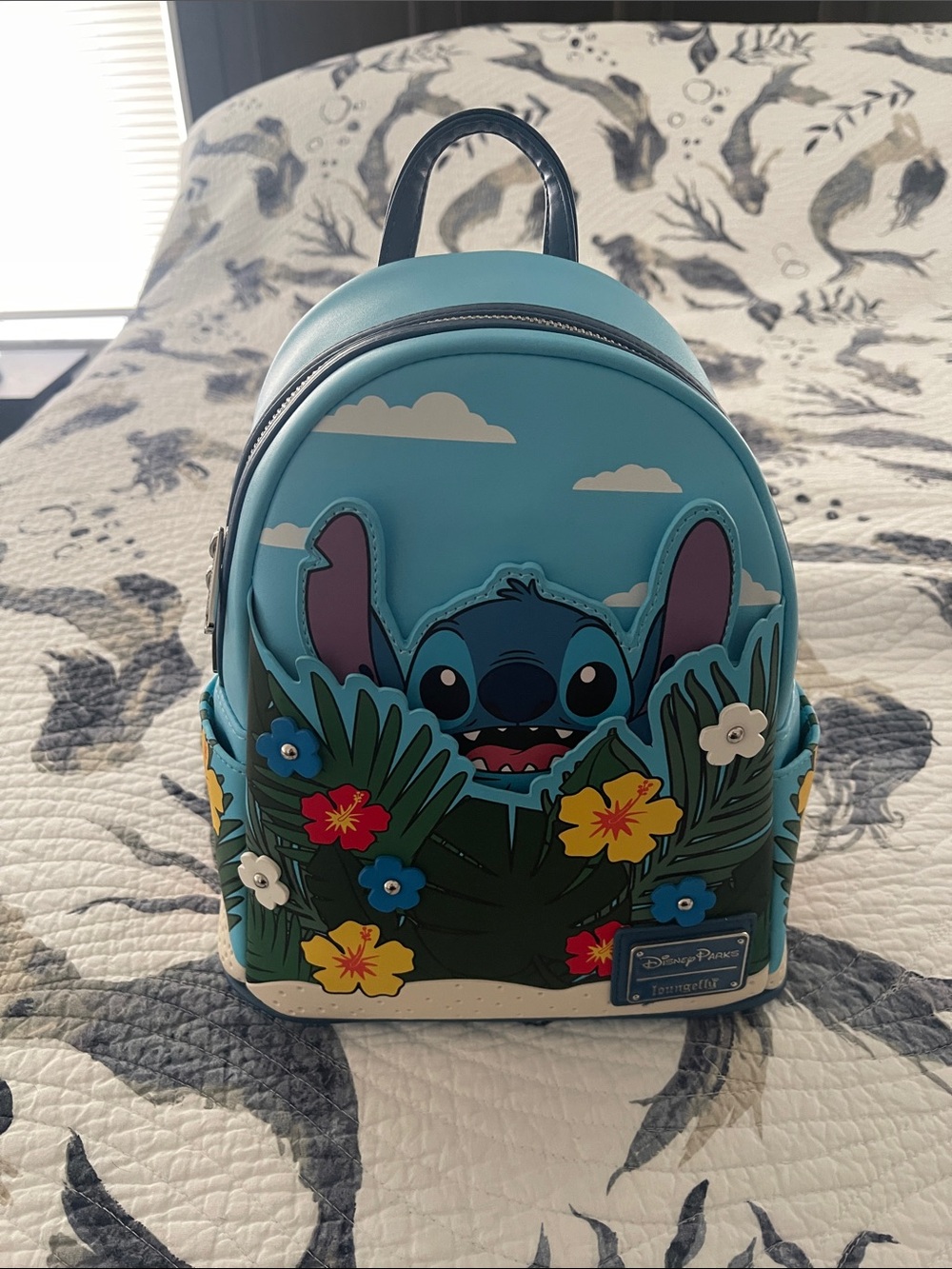 Loungefly Blue Stitch Peekaboo Mini Backpack with Tropical Floral Accents